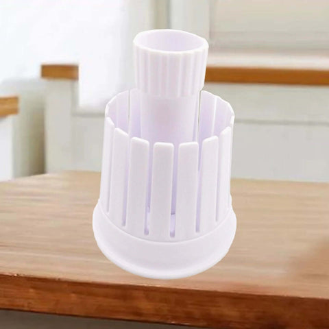 Front view of white plastic onion blossom maker, a kitchen cutter for making fried onion blossoms at home.