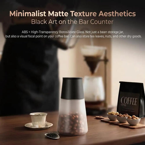 Keep Your Morning Brew Fresh As Heck With This Game Changing Smart Vacuum Sealed Coffee Canister Featuring Digital Pressure Gauge Rechargeable Design And Airtight Glass Storage on a wooden table.