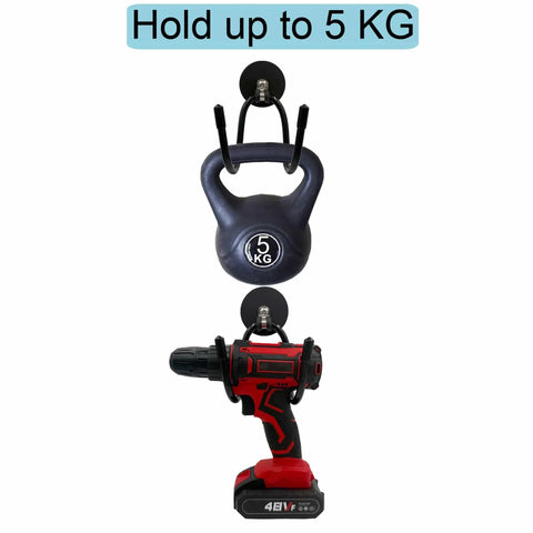 Magnetic Power Drill Tool Organizer Holder With Heavy Duty 2 Inch Opening Sweet For Garage Storage shown holding a drill and kettlebell.