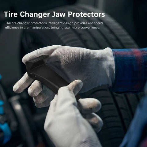 4 Pack Tire Changer Jaw Protectors Black Clamp Covers For Wheel Demount Machines Rim Safety Guards That Shield Jaws From Scratches And Dents Pro Shop Tire Service Tool in hand.