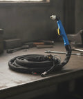Pro Grade Air Electric Discharge Severing Torch Kit For Slick Steel Cutting, featuring blue grip handle and coiled hose.