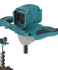 Cordless Post Hole Digger For 18V Battery Systems with auger attachment, shown in teal with black grips, designed for soil drilling.