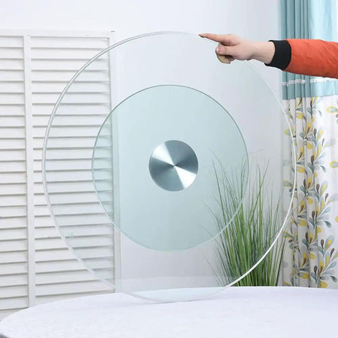Large Round Lazy Susan Turntable Glides Smooth As Butter Dual Plate Connection Heavy Duty Tempered Glass Serving Tray being held.