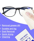Hand using Alcohol Free Lens Wipes For Glasses And Screens Streak Free 220 Count to clean eyeglasses, with packaging visible