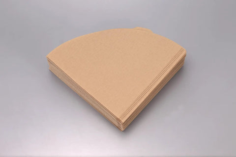 V60 Cone Coffee Filters Size 01 Natural 100 Count for Pour Over Brewers stacked on a grey background