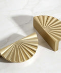 Six Pack Brushed Gold Half Moon Cabinet Pulls 2.5 Inch Center Spacing with polished finish on white surface