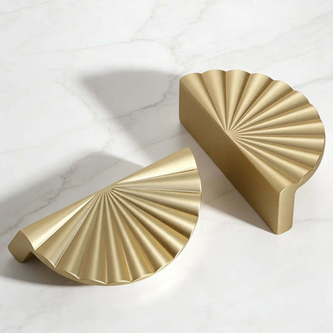 Six Pack Brushed Gold Half Moon Cabinet Pulls 2.5 Inch Center Spacing with polished finish on white surface