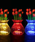 Amber LED Floral Tea Lights Submersible in glass vases with red tulips at wedding party