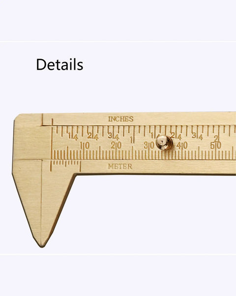Close-up of Dual Scale Calipers With Inch And Metric Scales For Jewelry Making, Woodworking, Metalworking, Brass Construction