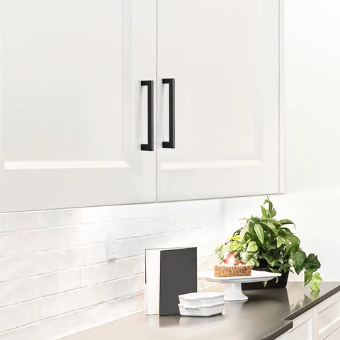 Matte Black Square Cabinet Handles Set for Kitchen Drawers 7.5 Inch Hole Centers 8 Inch Total Length 1.4 Inch Diameter installed on white cabinets