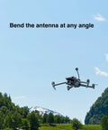 5.8GHz Long Range FPV Antenna Pack on RC drone flying over landscape, showcasing flexibility and signal stability.