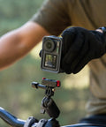 Knockout 4K Action Camera With Hella Solid Build And Smooth 120fps Shooting for adventure sports mounted on handlebars.