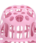 Close-up of pink Silicone Hat Washing Cage For Machine Wash, Reusable Cap Washer Bag That Prevents Deformation and hat loss.