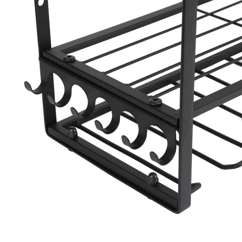 Close-up of the side hooks on the badass heavy duty wall mounted power tool organizer for fast access in a metal shop setup.