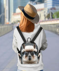 Back view of a woman wearing a Women Mini Backpack Purse With Alpaca Print Cute Small Daypack For Travel And Work on city street.