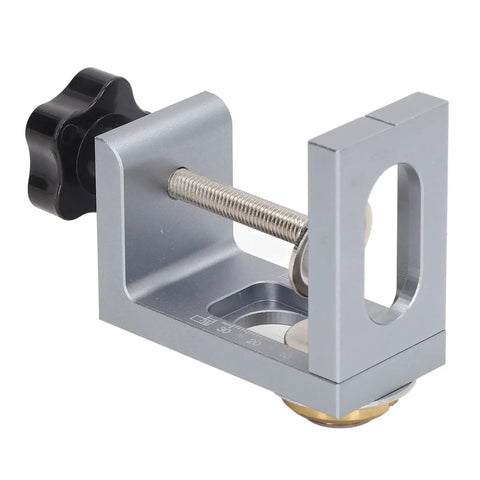 Professional Aluminum Doweling Jig Kit For Woodworkers Featuring Slick Setup And Dead Nut Hole Locator Accuracy With 8mm 10mm 12mm Drill Bits And Sleeves Perfect Clamping Guide close-up of aluminum doweling jig with adjustment knob and clamp.