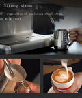 Built In Grinder Coffee Maker With Milk Frother Fully Automatic Espresso Machine Portable All In One Coffee Pot For Home Or Office Single Or Double Shot Capability Dark Grey Finish showing steaming and milk frothing close-up.