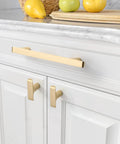 Brushed Gold Cabinet Pulls Pack Of 10, 5 Inch Hole Centers, Zinc Alloy And Brass Construction installed on white kitchen cabinets ZH0028