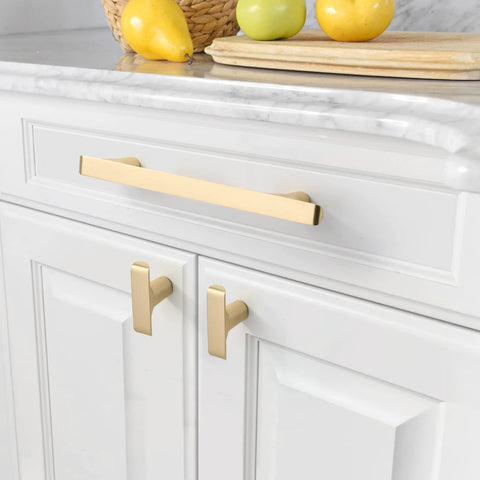 Brushed Gold Cabinet Pulls Pack Of 10, 5 Inch Hole Centers, Zinc Alloy And Brass Construction installed on white kitchen cabinets ZH0028