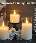 Rechargeable Flameless Candles Set Of Three With Real Wax Pillars, Flickering LED Flame, on display with timing settings