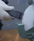 Heavy Duty 6 Inch Bench Grinder Wheels 80 Grit White Aluminum Oxide Vitrified Ceramic Stones sharpening a tool with sparks.