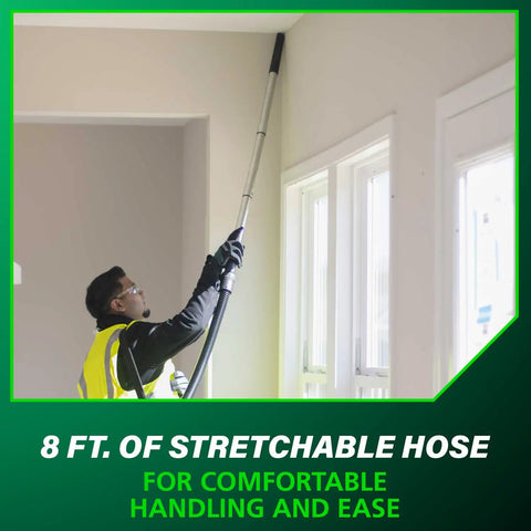 Person using Cordless 18V Wet Dry Vacuum Bare Tool, 8 foot stretch hose reaching high corner.