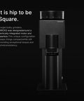 Badass Electric Coffee Grinder With 150 Tight Adjustments in matte black, compact design with vertically-integrated motor.