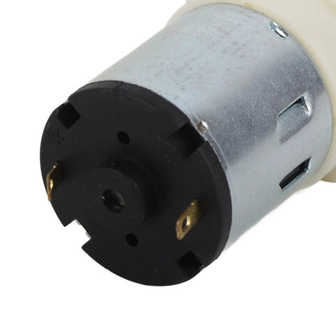 Close-up view of the motor of Smooth Operator Mini Vacuum Pump DC12V Low Noise Electric Air Motor for DIY tasks.