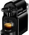 Compact Black Espresso Machine With 19 Bar High Pressure Pump And Quick 25 Second Preheat Featuring Programmable Buttons brewing espresso in glass.