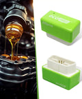 2 Pack OBD2 Fuel Saver Module For Most Cars Plug And Play Energy Optimizer That Talks To Your ECU visible next to engine oil pour