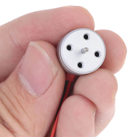 Person holding Kickass Mini RC Quadcopter Motor For DIY FPV Drones 1104 Brushless Micro Motor 1 2S 4300KV High Torque Quad Motor