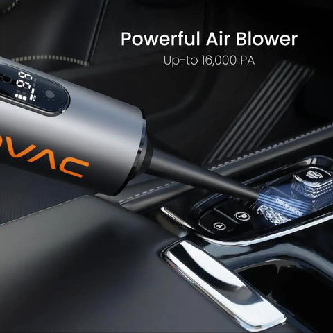 Heavy Duty Cordless Car Vacuum With 16000Pa Kickass Suction And HEPA Filter Handheld Detailer With Led Display Plus Dual Vacuum Blower Modes For Slick Auto Whip Cleanup close-up showing the vacuum nozzle reaching into car console.