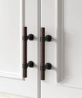 Ten Pack Three Inch Walnut Wood Grain Cabinet Pulls In Matte Black Metal Drawer Handles For Dresser And Cupboard Durable Wood Grain Finish Five Inch Total Length Three Inch Hole Centers For Easy Mounting installed on cupboard