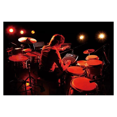 Musician playing HPD-20 Digital Hand Percussion Instrument With 850 Dope Ready To Play Sounds on stage with red lighting.
