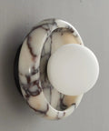 Alabaster Wall Sconce, 7.5" Natural Marble Wall Lamp with Milk Glass Shade, round stone design on wall.