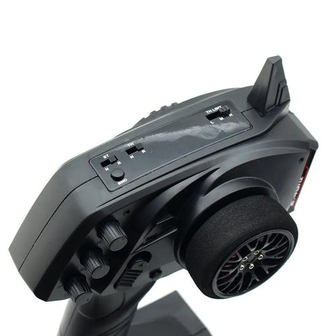 3 Channel 2.4G Anti-Jamming RC Transmitter With Receiver For RC Cars And Boats, close-up of control knobs