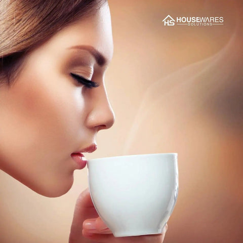 Woman enjoying brewed coffee, highlighting 12 Pack Replacement Charcoal Water Filters For Single Serve Coffee Makers