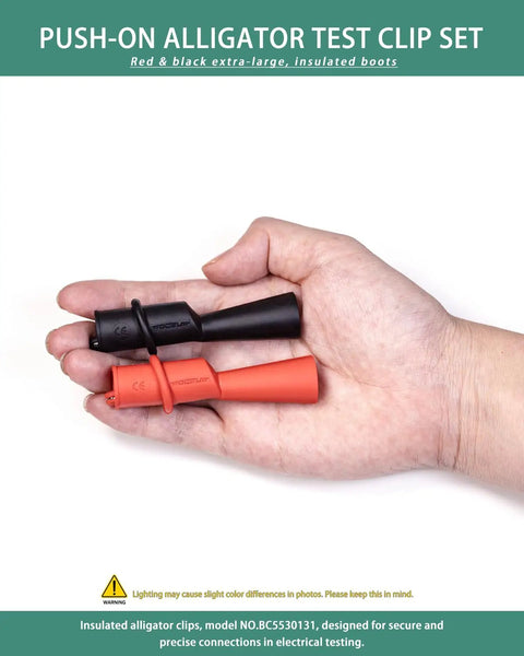 Hand holding insulated alligator clips for multimeter with 2mm probe tips, flexible boots, nickel plated safety clips.