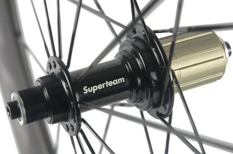 Close-up of hub and spokes on 88mm Carbon Fiber Wheelset for 700C Clincher, 23mm Inner Width, 3K Matte Rim, EN Tested.