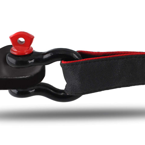 Close-up of black and red shackle connected to strap, part of 4 Pack 1/2 Inch D Ring Shackles Heavy Duty Tow Shackles With Screw Pin For Winch And Off Road Vehicle Recovery 12 Ton Break Strength Red And Black Ideal For Jeep Truck ATV UTV Recovery