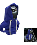 Cozy Hoodie Vibe Gear Shift Cover For Cars, warm blue knit shift knob sleeve with hood and decorative cords, installed in vehicle.