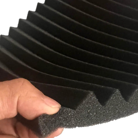 Close-up of 52 Piece Black Acoustic Foam Wall Panels With Heavy Duty Mounting Tape, showing wedge design for soundproofing.
