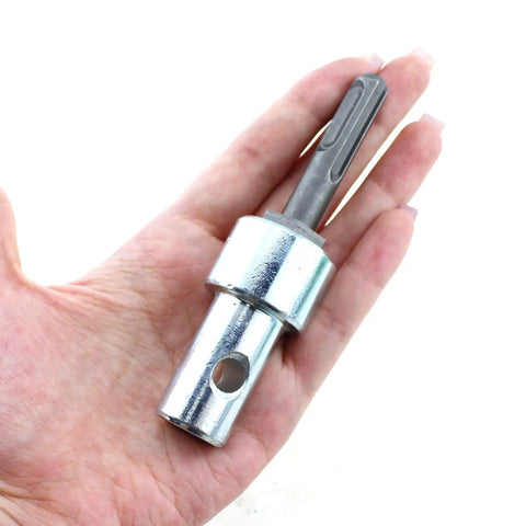 Person holding Heavy Duty Hardened Steel Round Shank Grounding Auger Adapter Three Quarter Inch To One Half Inch Connection