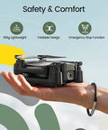 Hand holding foldable FPV drone with 1080P camera for beginners and kids gesture control quadcopter with modular battery.