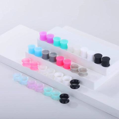 Silicone Ear Plugs Gauge Stretching Kit for Ear Piercings and Lobe Stretchers, 32 Pieces in mixed colors, displayed on white
