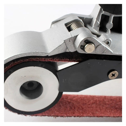 Close-up of Handheld Pipe Belt Sander And Tube Polisher For Circular Grinding And Rust Removal On Round Metal Pipes removing weld scars.