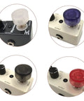 Guitar Pedal Footswitch Topper Set 20 Pack Multi Color Protection Caps For Common Pedal Switches Durable PVC Covers displayed on pedals