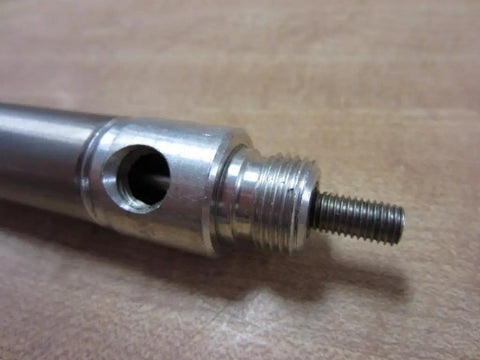 Straight Up Heavy Duty Pneumatic Cylinder With Three Quarter Inch Bore And Eight Inch Stroke Running As A Double Acting System With Secure Pivot Mount Design Crafted Tough To Dominate Busy Factory Floors Without Breaking A Sweat
