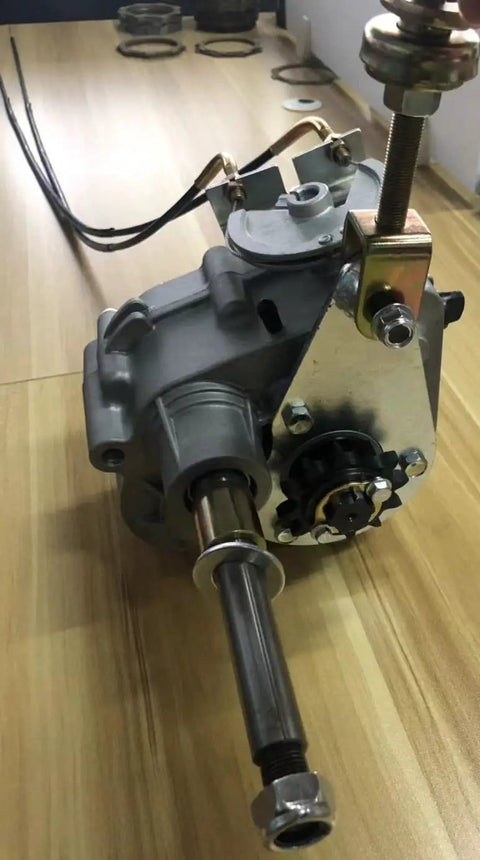 Forward Reverse Gearbox Kit for Go Karts with 11 to 18 HP engines, 40 Series Torque Converter compatible, shown on table.