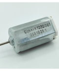 Heavy Duty DC 120V Electric Motor With Beefy Torque Output Runs Ultra Smooth Low Noise Design Built Like A Tank With Dust Resistant Housing For Non Stop Industrial Grind, showing compact metal casing and shaft.